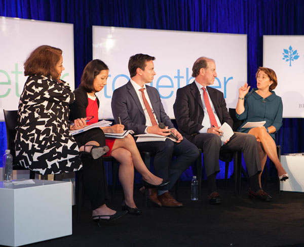 panel of speakers being interviewed